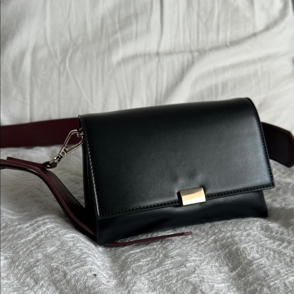 Zara Sophisticated Black and Gold Crossbody Bag with Structured Design